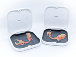 Two white cases with partial dentures inside on a light gray background